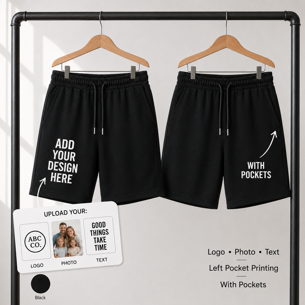Custom black shorts on hangers showing front print area and pocket detail
