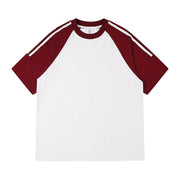 Close-up of the three-stripe sleeve detail on the cotton t-shirt